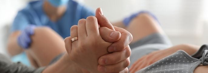 Woman Giving Child Birth in Maternity Hospital, Closeup