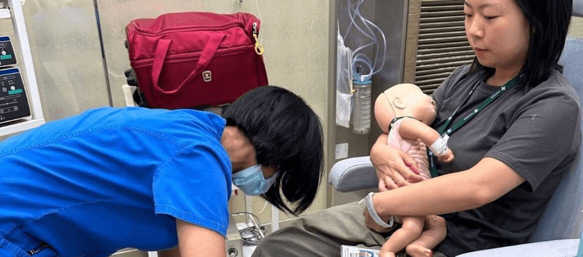 nurse caring for patient