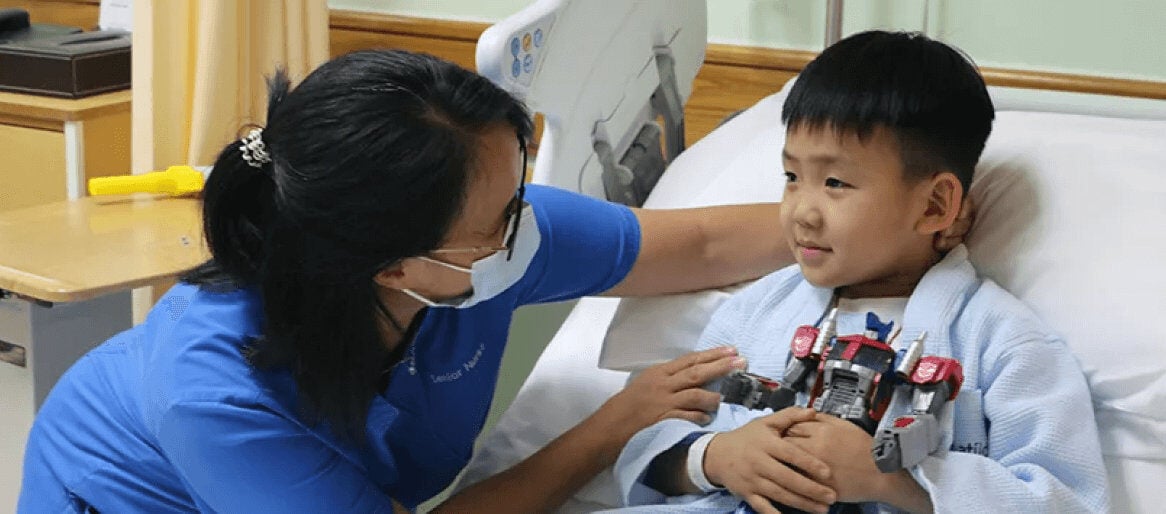 nurse caring for child