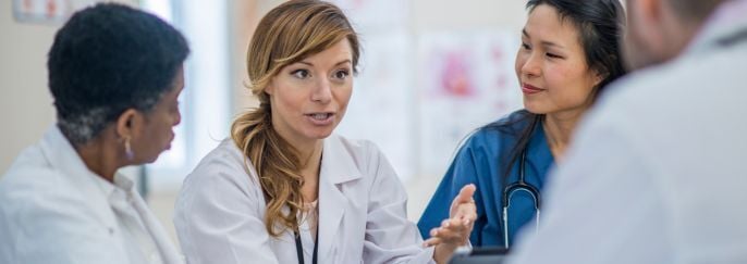 Doctor With A Tablet