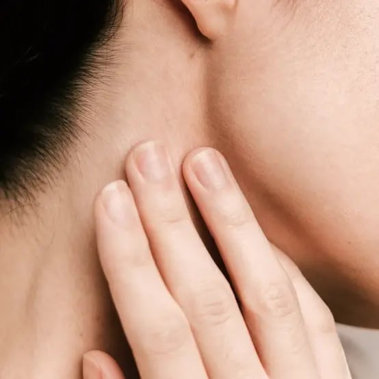 hand on neck