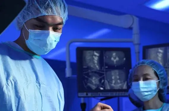 doctor and nurse inside a operating theatre
