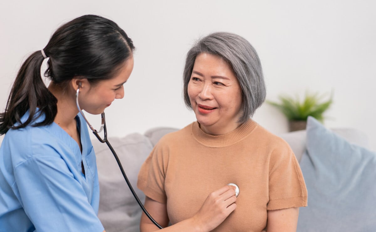 elderly patient getting pulse checked