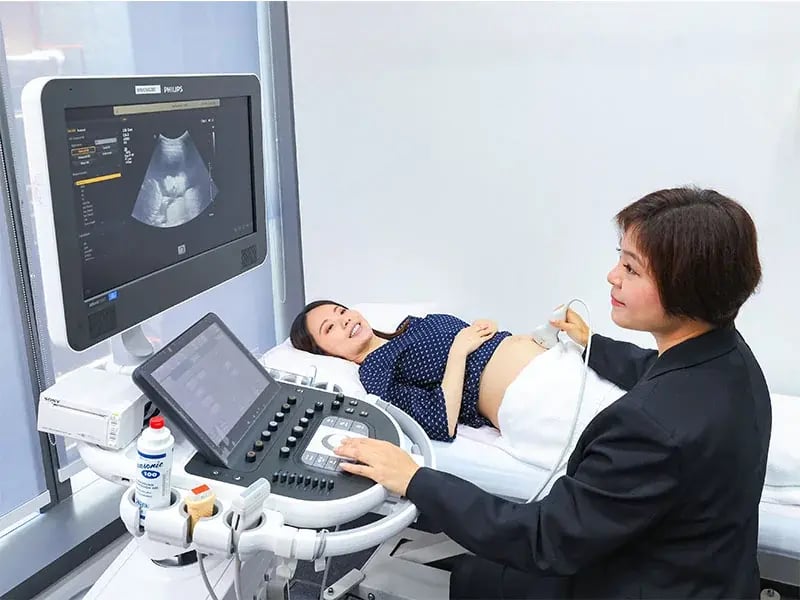 woman undergoing ultrasound scan