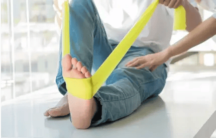 resistance band around patients foot
