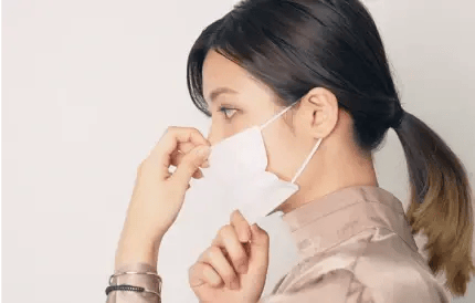women wearing a mask