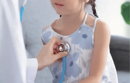 child getting pulse checked
