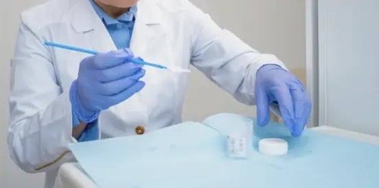 doctor testing specimen
