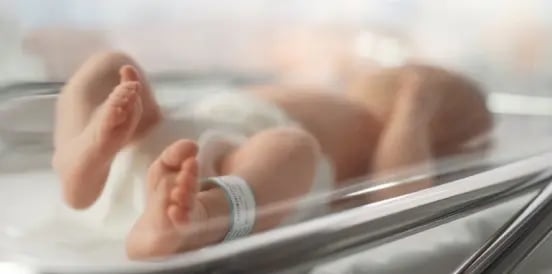 baby in cot 