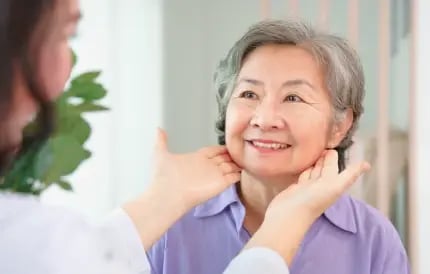 elderly women getting lymph nodes checked